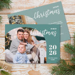 2 photos Christmas arch modern minimalist Holiday Card<br><div class="desc">This elegant and modern Christmas greeting card features a minimalist design displaying 2 of your favourite family pictures inside trendy arch frames. Easily customizable with your family name and the current year in stylish serif fonts over a modern teal background on the front and with your personal greeting message in...</div>