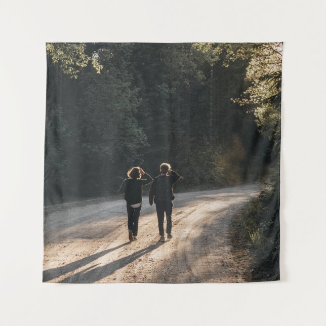 2 women walking on road between trees in the morni tapestry (Front)