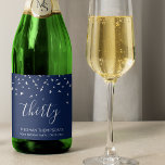 30th Birthday Elegant Navy Blue Silver Confetti Sparkling Wine Label<br><div class="desc">Help her celebrate her 30th birthday in style with this simple but elegant design, featuring faux silver triangular confetti sifting down on the word "thirty" in silver grey handwriting font on a navy blue background. Personalize it with the name of the honoree in silver grey sans serif font, along with...</div>