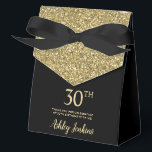 30th Birthday Gold Glitter Thank You Favor Box<br><div class="desc">This fabulous modern 30th Birthday Gold Glitter Thank You favor box with sparkling gold glitter, the birthday girl's name in a trendy script font, and tied with an elegant black bow would be perfect for your event. It would be great for a candy station, on a thank you gift table,...</div>