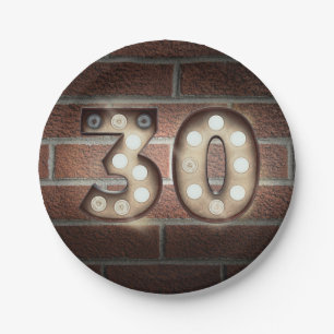 30th birthday marquee sign on brick wall paper plate