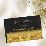 30th birthday party black gold bow glam sparkle guest book<br><div class="desc">Elegant, classic, glamourous and feminine. A faux gold coloured ribbon with a bow with golden faux glitter and sparkle, a bit of bling and luxury. A guestbook for a 30th birthday party. The name is written with golden trendy hand lettered style script. Black background. Spine: template for your own text....</div>