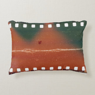 35mm filmstrip start, cool scratches. accent pillow