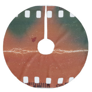 35mm filmstrip start, cool scratches. brushed polyester tree skirt