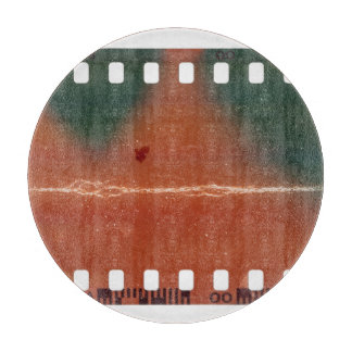35mm filmstrip start, cool scratches. cutting board