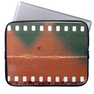 35mm filmstrip start, cool scratches. laptop sleeve
