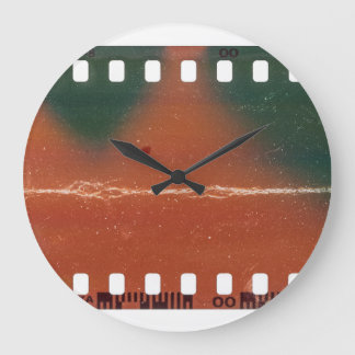 35mm filmstrip start, cool scratches. large clock