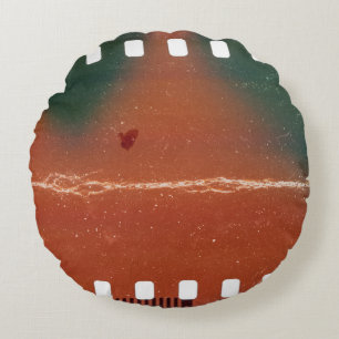 35mm filmstrip start, cool scratches. round pillow