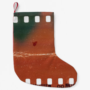 35mm filmstrip start, cool scratches. small christmas stocking