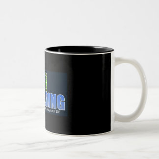 39 and Holding Mug