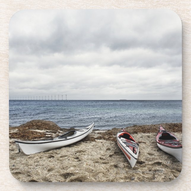 3 kayaks on beach coaster (Front)