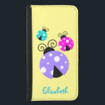 3 Ladybugs in Purple Pink and Blue Personalized Samsung Galaxy S5 Wallet Case<br><div class="desc">Some whimsical and cute ladybugs. These brightly coloured ladybugs have delightful round bodies with cute white polka dots across the back. Their heads are a half moon shape in black and have cute curly shaped feelers. These 3 ladybugs are painted bright purple, pink and blue. Personalize / customize with a...</div>