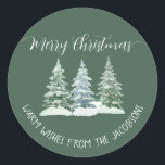 3 Pine Trees Rustic Sage Green Merry Christmas Classic Round Sticker<br><div class="desc">These sage green coloured holiday stickers are perfect as envelope seals or gift tags. They feature a rustic watercolor design with three snow covered pine, fir, or spruce trees and elegant script calligraphy lettering reading: Merry Christmas! There is space for a short note or message below. Optimized for round shaped...</div>