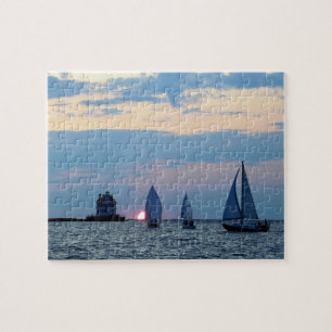 3 voiliers au puzzle de coucher du soleil