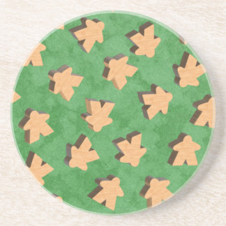 3D Wood Meeple Game Piece on Green Coaster