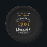 40th Birthday 1981 Legendary Personalized Retro Paper Plate<br><div class="desc">For those born in 1981 and celebrating their 40th birthday we have the ideal birthday paper plates. The black background with a white and gold vintage typography design design is simple and yet elegant with a retro feel. Easily customize the text of this birthday gift using the template provided. More...</div>