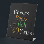 40th Birthday Cheers Beers Golf Black Gold Party Pedestal Sign<br><div class="desc">This is a cool and modern, 40th birthday, golf party design. It is a simple, minimal design, in classic black and gold typography with pops of orange and green. Perfect for a cool and fun, golf and beer themed, 40th birthday party. This design is fully customizable, simply use the personalize...</div>