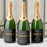 40th Birthday Name 1984 Black Gold Elegant Chic<br><div class="desc">1984 Vintage 40th Birthday Black & Gold Elegant Label. Celebrate your milestone with our exclusive 1984 Vintage 40th birthday label. The meticulously designed label with stunning black and gold hues effortlessly enhances the visual appeal of your favourite sparkling wine. The year 1984, prominently featured on the label, adds a nostalgic...</div>