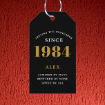 40th Birthday Name 1984 Black Gold Elegant Chic Gift Tags<br><div class="desc">Elegant Chic 1984 Black Gold Personalized 40th Birthday Gift Tags. Celebrate the milestone birthday with our Elegant Chic 1984 Black Gold Personalized 40th Birthday Gift Tags. Each gift tag is meticulously designed with a black and gold colour scheme that oozes elegance. Fully personalized to add that exclusive touch, these gift...</div>