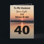 40th Birthday To My Husband Light Shines Bright Card<br><div class="desc">Celebrate a wonderful 40th birthday for your husband with a positive quote “Your light still shines bright”. The calm and peaceful sunset image sends a bold message in black,  gold and tan. He will smile at the verse wishing a day of joy and happiness.</div>
