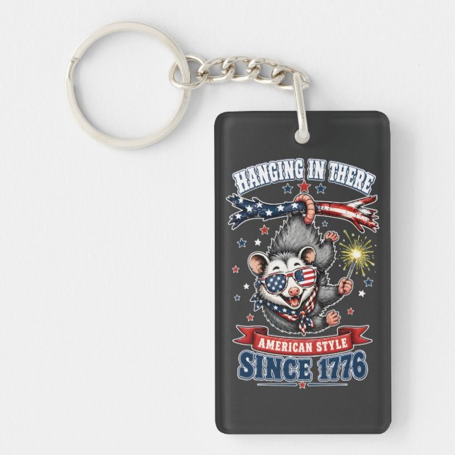 ​4th of July Opossum Hanging In There Keychain (Front)