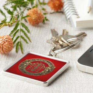 [500] Two Gold Ninurtas with Tree of Life Keychain