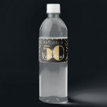 50 and Fabulous Gold Personalized Birthday Party Water Bottle Label<br><div class="desc">Celebrate turning 50 in style with this modern 50th birthday design. The word 50 is in a classic faux gold glitter ritz typography with the personalized name & Fabulous in a white text on a black background. You can personalize this gift by changing the name to whatever you like. To...</div>