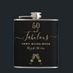 50 fabulous birthday black gold monogram friends hip flask<br><div class="desc">Simple and elegant 50th birthday gift for a woman from her friends or family. A classic chic black background with two champagne glasses, flutes as decor. With the text: 50 and fabulous. Personalize and add a name and a date. Golden coloured letters. The word Fabulous is written with a trendy...</div>
