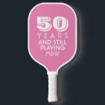 50 Years Still Playing Custom Text Age Name Colour Pickleball Paddle<br><div class="desc">Funny pickleball paddle that reads "50 Years and Still Playing" Change the age to 40, 60, 70, 80, etc. and the text to still pickling, still swinging, etc. Also add the person's monogrammed initials, name or just leave blank and also easily change the background colour. Makes a perfect birthday, retirement,...</div>