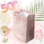 50th birthday 50 rose gold glitter drips name medium gift bag<br><div class="desc">A gift bag for a feminine and glamourous 50th birthday.  A faux rose gold background with an elegant faux rose gold glitter drips,  paint drip look. The text: The name is written in dark rose gold with a modern hand lettered style script. Tempate for a date and age 50.</div>