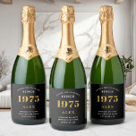 50th Birthday Name 1975 Black Gold Elegant Chic<br><div class="desc">Vintage Birthday Black & Gold Elegant Label. Celebrate your milestone with our exclusive sparkling wine birthday label. The meticulously designed label with stunning black and gold hues effortlessly enhances the visual appeal of your favourite sparkling wine. The year prominently featured on the label, adds a nostalgic throwback to the year...</div>