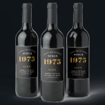 50th Birthday Name 1975 Black Gold Elegant Chic<br><div class="desc">1975 Vintage 50th Birthday Black & Gold Elegant Wine Label. Celebrate your milestone with our exclusive birthday wine label. The meticulously designed label with stunning black and gold hues effortlessly enhances the visual appeal of your favourite wine. The year prominently featured on the label, adds a nostalgic throwback to the...</div>