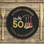 50th Birthday Party Name Guitars Rocks 50 Paper Plate<br><div class="desc">Custom Rocks 50 gold modern typography 50th birthday party can cooler with musical notes and three cool psychedelic colourful guitar designs on black background. Electric guitar, acoustic guitar and acoustic guitar art illustration in vibrant colours. This easy to use template to change the age and name creates the perfect party...</div>