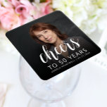 50th Birthday Party Photo White Cheers Square Paper Coaster<br><div class="desc">This custom 50th birthday paper coaster features the guest of honour's personalized photo,  name,  and birthday,  along with the word "Cheers" in elegant white calligraphy script. A dark screen helps make the text pop. A great way to celebrate someone who's turning fifty!</div>