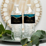 50th Birthday Party Teal Blue Gold Agate Water Bottle Label<br><div class="desc">These chic 50th birthday water bottle labels feature a watercolor image of an agate geode in shades of teal blue with faux gold glitter highlights. The words "50th Birthday" appear in faux gold glitter in a decorative modern handwriting font. Customize it with the name of the guest of honour and...</div>