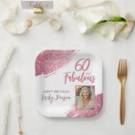 60 and Fabulous Pink Glitter Photo 60th Birthday Paper Plate<br><div class="desc">60 and Fabulous Pink Glitter Photo Surprise 60th Birthday Party Plates. Throw a stunning celebration with these “60 and Fabulous” pink glitter birthday plates. Featuring sparkly faux-glitter brush strokes, and space for a personal photo, this elegant design is perfect for honouring a fabulous woman’s milestone birthday. Fully customizable to include...</div>