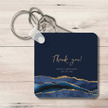 60th Birthday Blue Gold Thank You Metal Keychain<br><div class="desc">Looking for the perfect party favour or giveaway for your loved one's birthday celebration? Look no further than this elegant "Thank You" metal keychain! The blue agate slice border with shimmering gold glitter accents is sure to catch the eye of your guests and leave a lasting impression. This keychain is...</div>