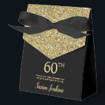 60th Birthday Gold Glitter Thank You Favor Box<br><div class="desc">This fabulous modern 60th Birthday Gold Glitter Thank You favor box with sparkling gold glitter, the birthday girl's name in a trendy script font, and tied with an elegant black bow would be perfect for your event. It would be great for a candy station, on a thank you gift table,...</div>