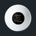 60th Birthday Golf Cheers and Beers Black and Gold Golf Balls<br><div class="desc">This is a cool and modern, 60th birthday, golf design. It is a simple, minimal design, in classic black and gold typography with pops of orange and green. Perfect for a cool and fun, golf and beer themed, 60th birthday gift or party accessory and ideal as birthday keepsakes or party...</div>