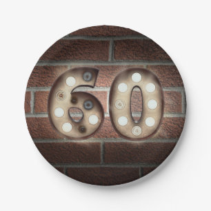 60th birthday marquee sign on brick wall paper plate