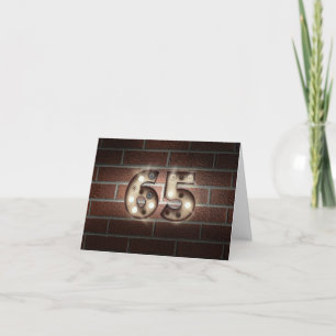 65th birthday-marquee lights on brick wall card