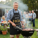 70th Birthday 1956 Name Chic Elegant Black Gold Apron<br><div class="desc">Elegant Black & Gold Chic Apron - 70th Birthday 1956 Name Personalized Kitchen & BBQ Essentials. Celebrate a fabulous birthday with style and practicality! This Elegant Black & Gold Chic Apron, personalized for those born in 1956, is the perfect accessory for the culinary enthusiast in your life. Its eye-catching design,...</div>