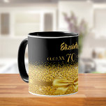 70th birthday black gold elegant name classic mug<br><div class="desc">Elegant, classic, glamourous and feminine. A gold coloured ribbon and bow with golden glitter and sparkle, a bit of bling and everyday luxury. Black background. The Perfect gift for a 70th birthday! Templates for a name, age 70 and date of birth and the anniversary date. Golden letters. The name is...</div>