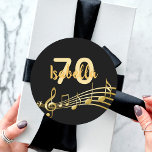 70th birthday gold music notes on elegant black classic round sticker<br><div class="desc">Black background with faux gold music notes for a 70th birthday party. Templates for age and name.  The name is written in a hand-lettered style script.  Golden letters and number.</div>