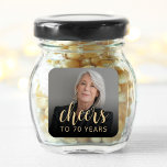 70th Birthday Party Photo Cheers Square Sticker<br><div class="desc">This custom 70th birthday sticker features the guest of honour's personalized photo and birthday,  along with the word "Cheers" in elegant gold-coloured calligraphy script. A dark screen helps make the text pop. A great way to celebrate someone who's turning seventy!</div>