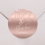 70th Birthday Party Rose Gold Glitter Classic Round Sticker<br><div class="desc">Send out your seventieth birthday party invitations and correspondence sealed with these chic and elegant personalized stickers. "70 & Fabulous" is written in stylish white script against a rose gold background,  with rose gold faux glitter dripping from the top. Personalize with your name.</div>