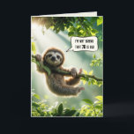 70th Birthday Sloth Humour Card<br><div class="desc">A cute sloth hangs from a tree branch surrounded by lush green leaves,  with sunlight streaming through the canopy for a 70th birthday</div>