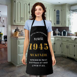 80th Birthday 1945 Name Chic Elegant Black Gold Apron<br><div class="desc">Elegant Black & Gold Chic Apron - 80th Birthday 1945 Name Personalized Kitchen & BBQ Essentials. Celebrate a fabulous birthday with style and practicality! This Elegant Black & Gold Chic Apron is the perfect accessory for the culinary enthusiast in your life. Its eye-catching design, enhanced with a touch of gold,...</div>