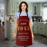 80th Birthday 1945 Name Chic Elegant Red Gold Apron<br><div class="desc">Elegant red & gold chic apron - 80th Birthday 1945 Name Personalized Kitchen & BBQ Essentials. Celebrate a fabulous birthday with style and practicality! This elegant chic apron is the perfect accessory for the culinary enthusiast in your life. Its eye-catching design, enhanced with a touch of class, adds a charming...</div>