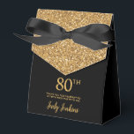80th Birthday Black Gold Glitter Thank You Favor Box<br><div class="desc">This fabulous modern 80th Birthday Black Gold Glitter Thank You favour box with sparkling gold glitter, the birthday girl's name in a trendy script font, and tied with an elegant black bow would be perfect for your event. It would be great for a candy station, on a thank you gift...</div>